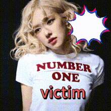 a blonde woman wearing a number one victim shirt