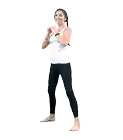 a woman in a white tank top and black pants squatting