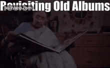 Revisiting Old Albums.Gif GIF - Revisiting Old Albums Old Albums Revisiting GIFs
