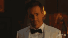 Smirk Nolan Booth GIF - Smirk Nolan Booth Ryan Reynolds GIFs