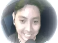 a close up of a person 's face with a blurred background and a globe in the background