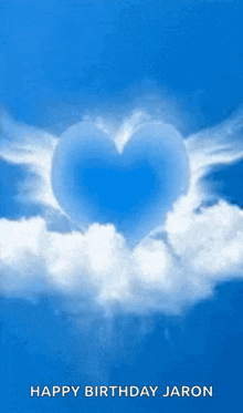 a blue sky with white clouds and a heart with wings on it