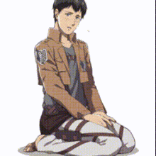 a man in a brown jacket is kneeling down and holding a soccer ball .