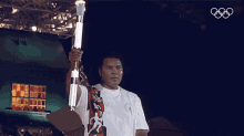 Holding The Torch Muhammad Ali GIF - Holding The Torch Muhammad Ali Olympic Games GIFs