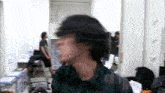 a blurry picture of a man 's face in a dressing room