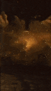 a large explosion with a few letters coming out of the center