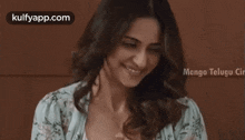 a close up of a woman 's face with the words mango telugu cir on the bottom