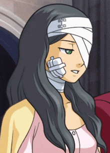 a woman with a bandage on her head and a bandage on her neck