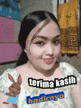 a picture of a woman with the words terima kasih