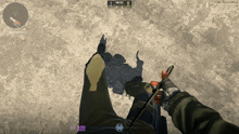 a screenshot of a video game shows a person 's feet and a scoreboard that says 1 on it