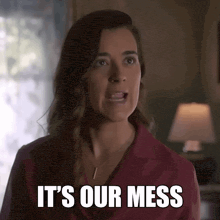 a woman says " it 's our mess " in a room