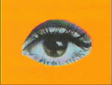 a psychedelic painting of a woman 's eye with a checkered background