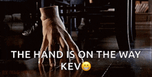 the hand is on the way with a smiley face on the bottom