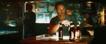Eric Northman Alexander Starsgard GIF - Eric Northman Alexander Starsgard In A Bar Drinking GIFs
