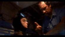 a man wearing glasses and a helmet is crying