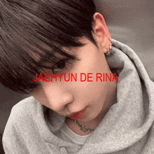 a close up of a person 's face with the name jaehyun de rina written on it