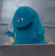 a blue monster with a red eye is standing on a ledge