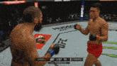 two men are fighting in a ufc ring and the ufc scoreboard says zhang vs tokkos