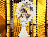 a woman in a white dress is standing in front of a gold wall with t4yce tumblr written on the bottom right