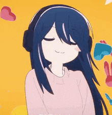 a girl with long blue hair is wearing headphones and a pink sweater .