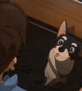 a man is sitting on a stool in front of a light