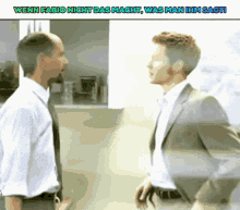 two men in suits are standing next to each other with the caption wenn fabio nicht das macht was man ihm sagt