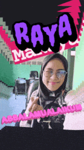 a woman wearing glasses and a hijab with the word raya on the top