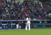 a baseball player wearing a jersey with the number 43 on it