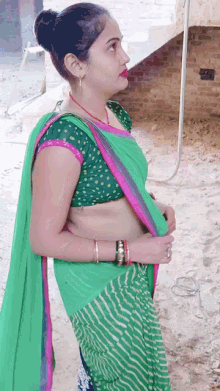 green saree ayushi golmatol