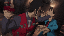 a man in a red vest is pointing a gun at another man