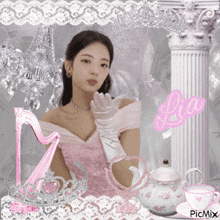 a picture of a girl in a pink dress with the name lia on the bottom right