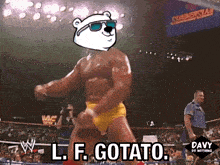 a man in a wrestling ring with a polar bear head and the words l.f. gotato