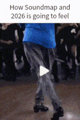 a man in a blue jacket is dancing in front of a crowd with the caption how soundmap and 2026 is going to feel ..