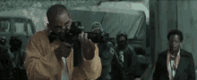 Deadshot Firing Gun GIF - Deadshot Firing Gun Suicide Squad GIFs