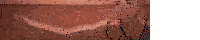 a man is standing on a beach with a shadow of a wave on the wall behind him .