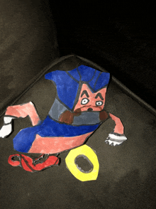 a drawing of a cartoon character laying on a couch with a yellow ring