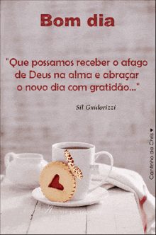 a picture of a cup of coffee and a cookie with the words bom dia on it