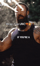 a man with a beard is wearing a black tank top that says if you 're a