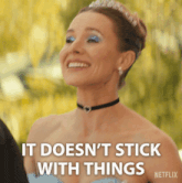a woman wearing a choker and a tiara says it does n't stick with things netflix