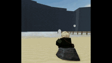 a person sitting on a rock in a video game looking at a wall