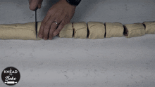 Cutting The Rolls A Knead To Bake GIF - Cutting The Rolls A Knead To Bake Dividing Chocolate Rolls GIFs
