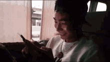 Asian Texting GIF - Asian Texting Laughing GIFs