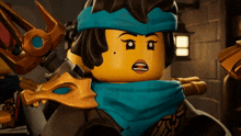 a lego figure with a scarf around her neck