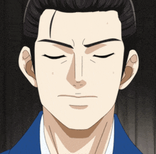 a man with his eyes closed and a blue shirt on