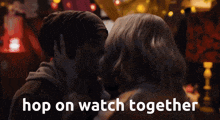 a man and woman kissing with the words hop on watch together below them