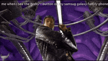 a man is pointing at the camera with the caption " me when i see the bixby button on my samsung galaxy family phone " .