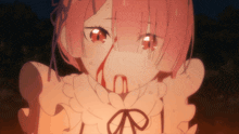 a close up of a girl with blood coming out of her mouth