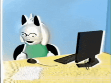 a cartoon character is sitting at a desk with a computer and mouse