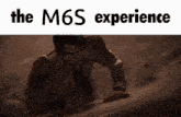 a man is crawling up a hill with the words the m6s experience written above him