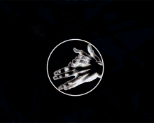 a hand is in a circle with a red background